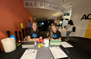 Betsy Pajevski from SW & volunteer Violet Varner ready to check in attendees