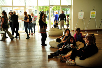 Attendees enjoy the oversized bean bag chairs